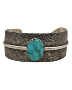 TURQUOISE OVAL FEATHER BACKGROUND CUFF